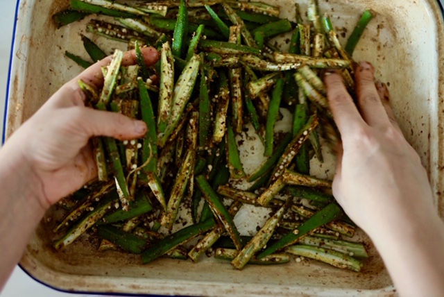 mixing okra and spices